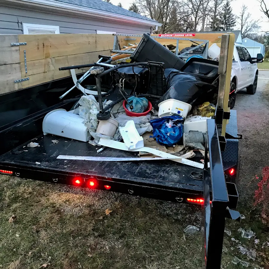 Roll-off dumpster delivered to a residential driveway in West Chicago